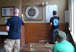 A good game of arrows... Speed & Jnr. playing darts
